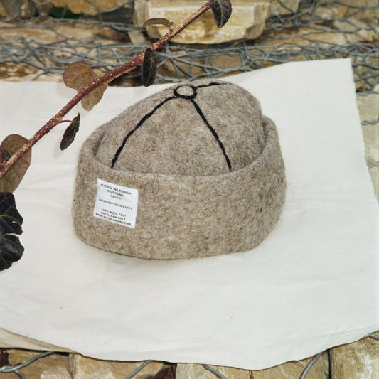 Detailed view of Ash hat’s craftsmanship and minimalist design