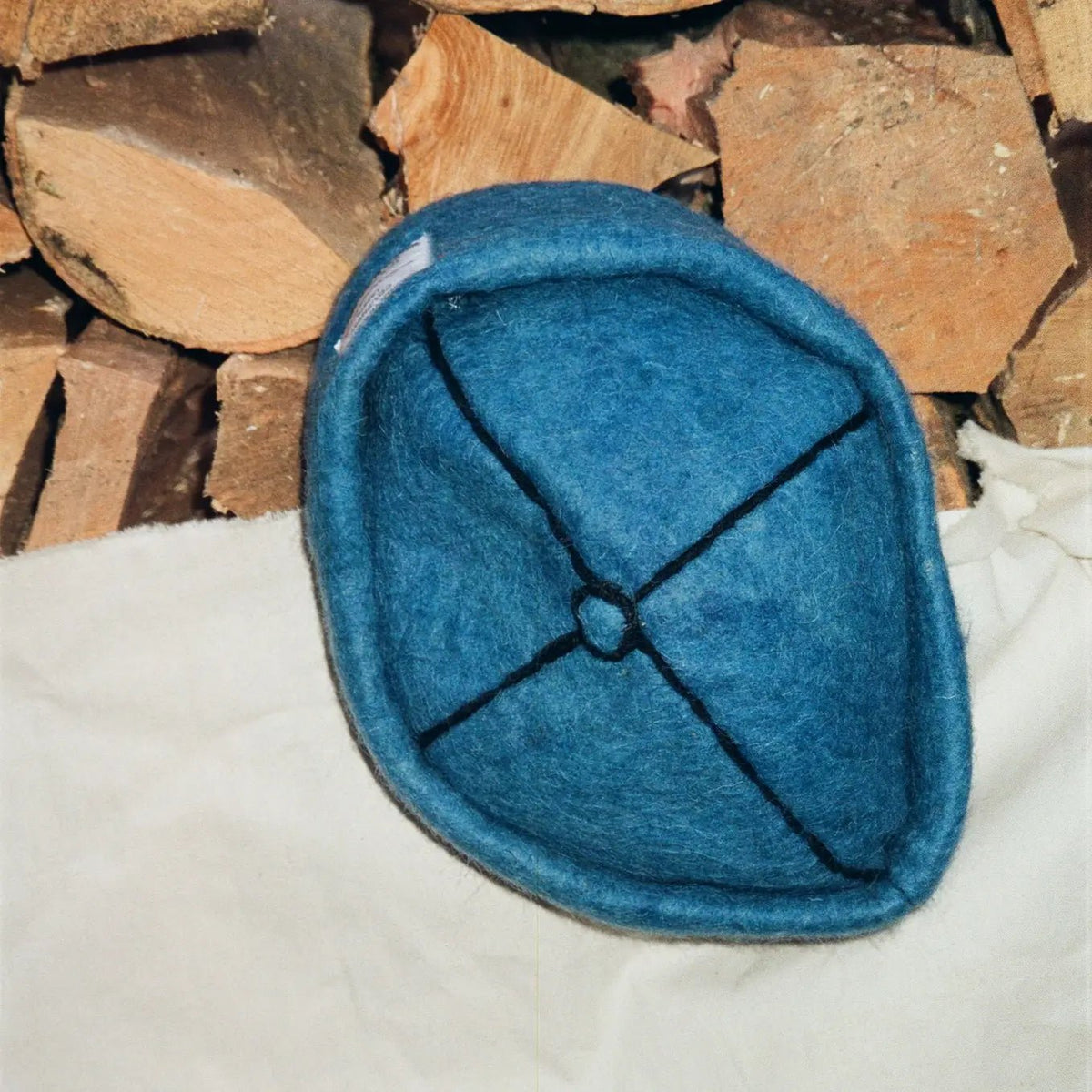 Detailed view of Azure hatâ€™s craftsmanship and subtle stitching details