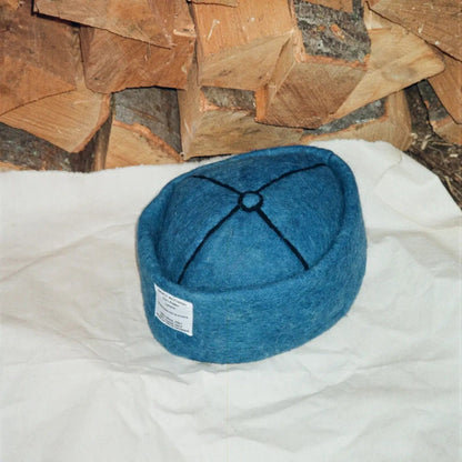 Azure wool felt hat showcasing its clean design and premium wool.