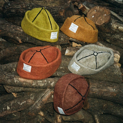 Collage of Tobacco, Mocha, Ash, Mustard, and earthy-toned wool felt hats, showcasing their warm, natural colors and handcrafted 100% wool design