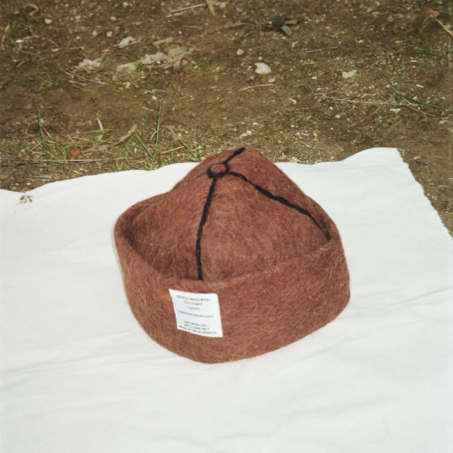 Mocha wool felt hat in warm earthy tones, crafted from 100% natural wool