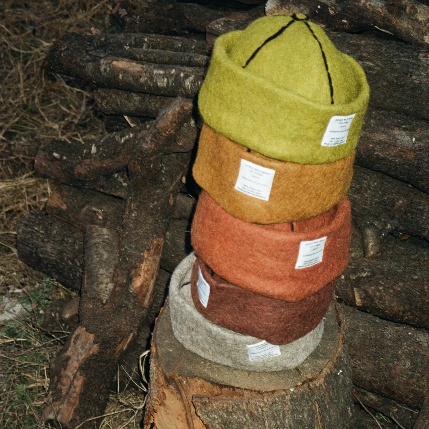 Collage of Ash, Mustard, Tobacco, Mocha, and Chocolate wool felt hats, showcasing earthy tones and handcrafted 100% wool design