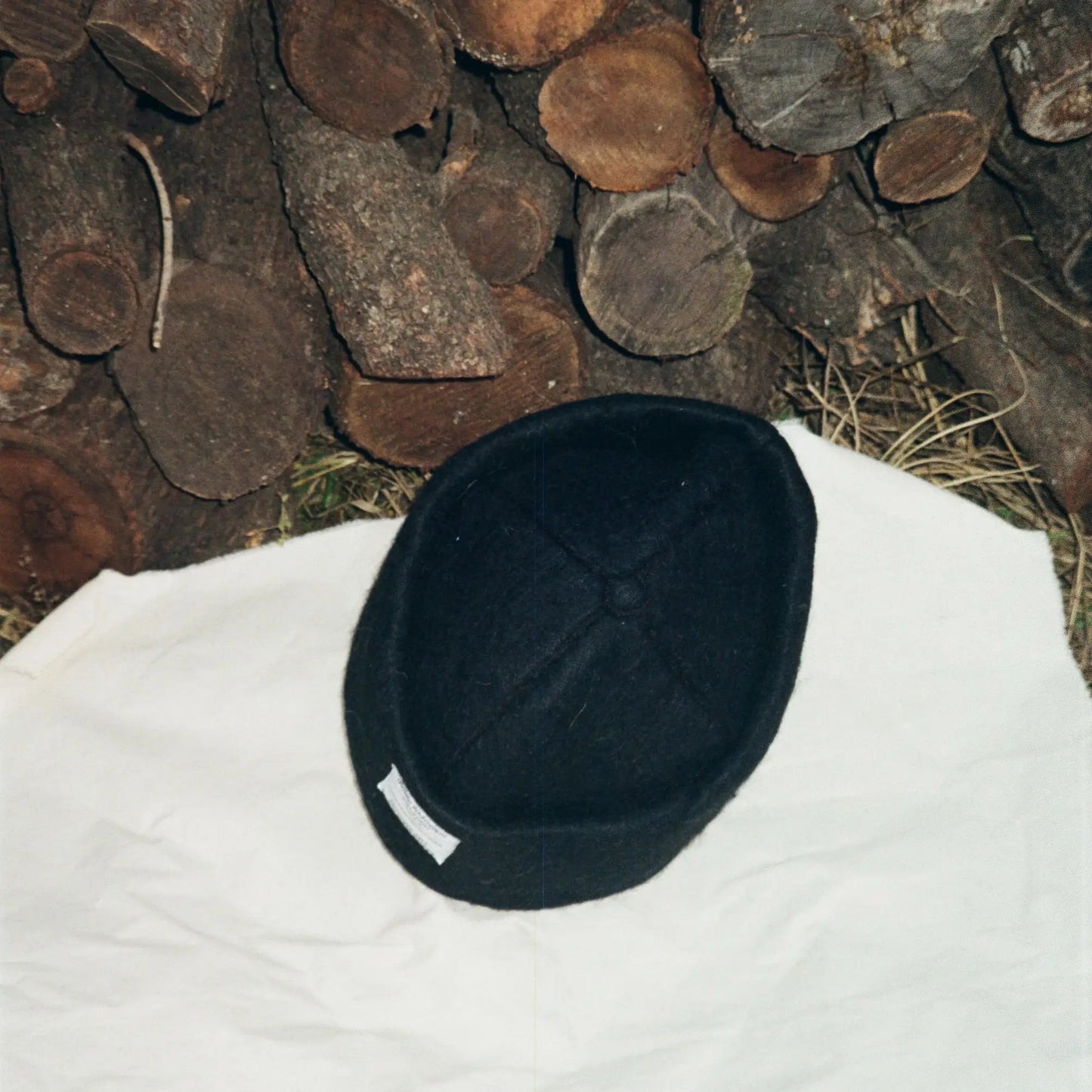 Obsidian wool felt hat showcasing its elegant, handcrafted design