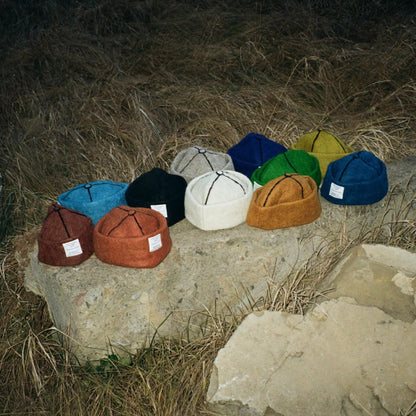 Collage of all wool felt hat colors, blending bold, neutral, and earthy shades, made from 100% natural wool with meticulous attention to detail