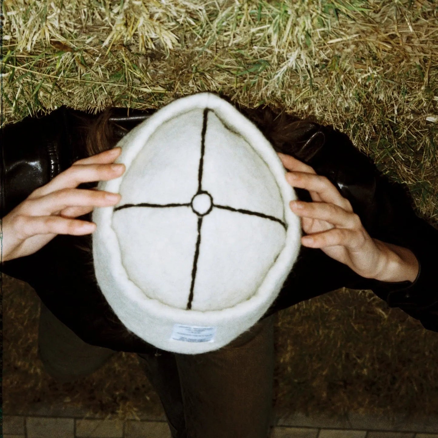 Model styling Snow White wool felt hat with a clean, modern look