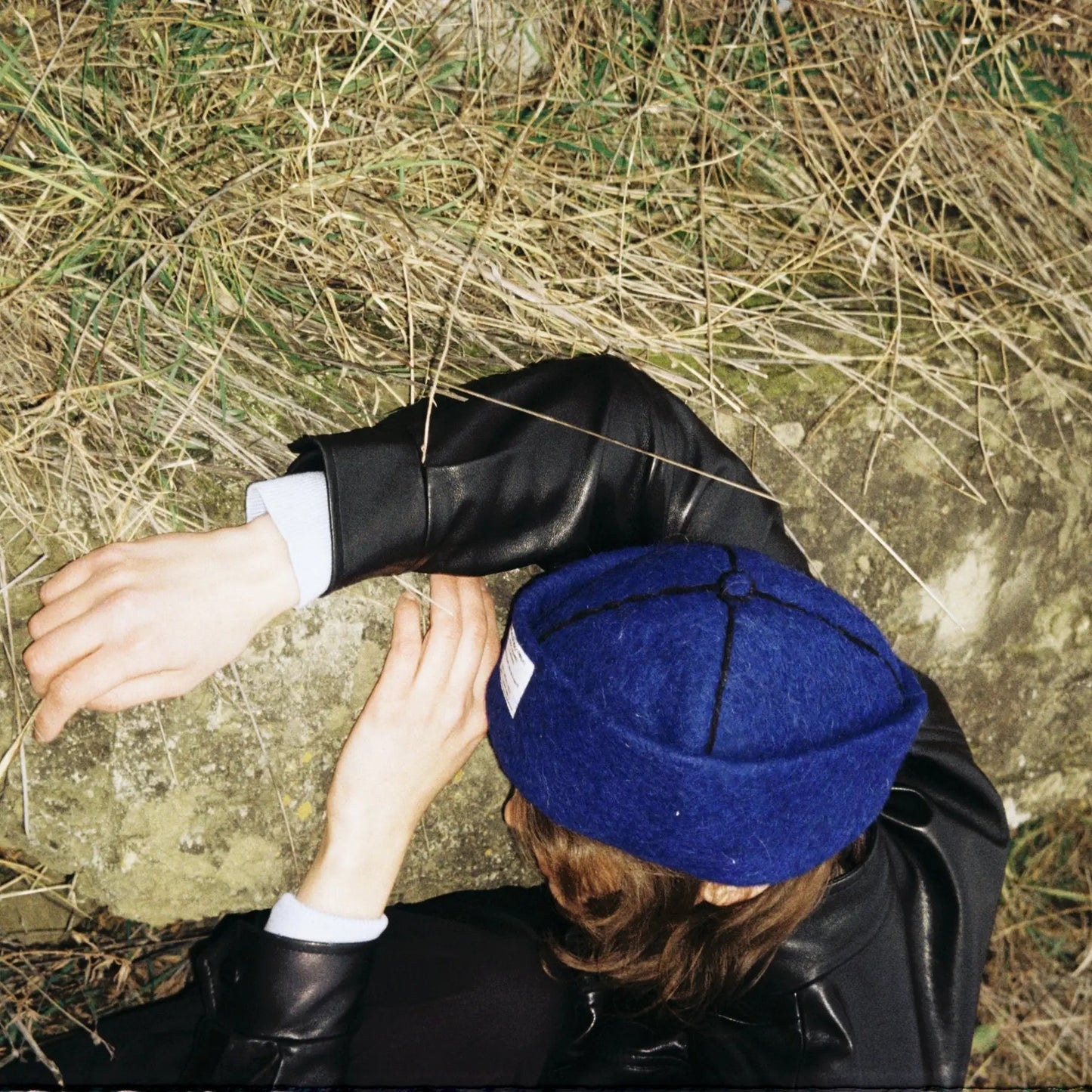 Mariam wears Denim wool felt hat styled for a casual yet refined everyday look