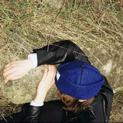 Mariam wears Denim wool felt hat styled for a casual yet refined everyday look